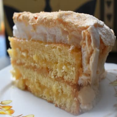 Lemon Meringue Cake slice on a plate